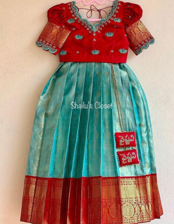 red and turquoise Lehenga Choli.